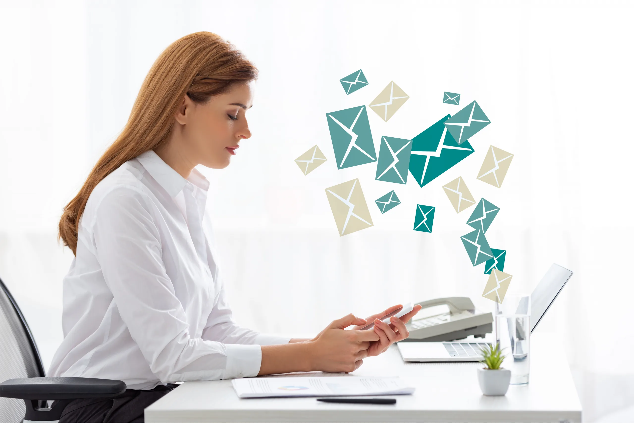 Side view of businesswoman using smartphone near documents and laptop on table, e mail illustration