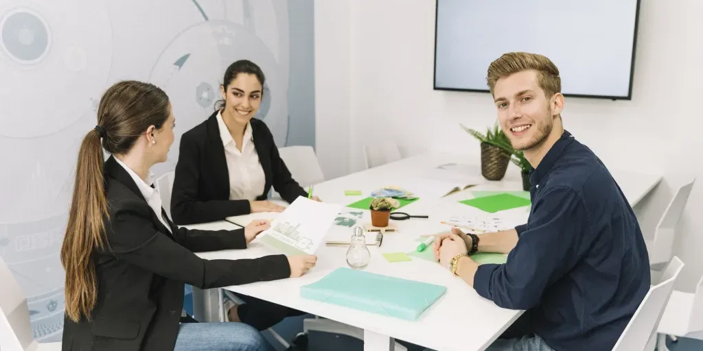 group smiling young businesspeople workplace group smiling young businesspeople workplace