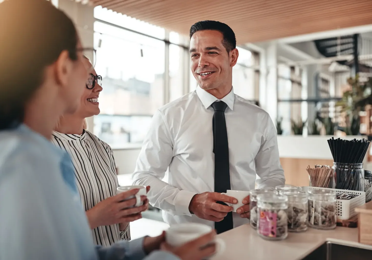 laughing-businesspeople-chatting-web