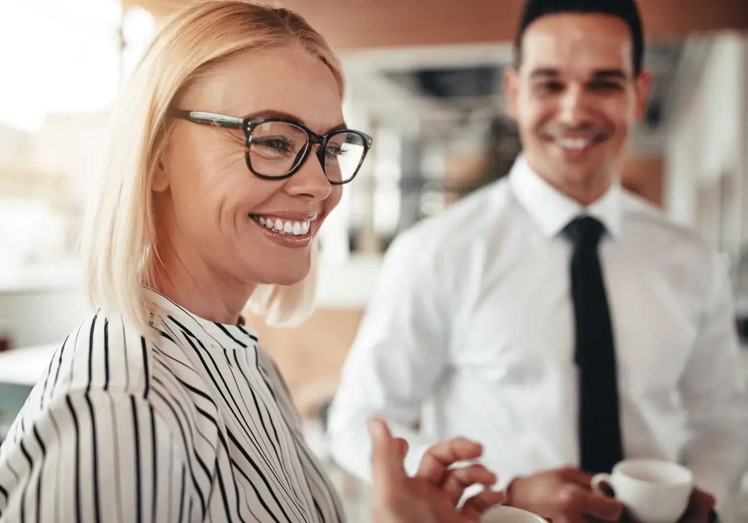 smiling-businesswoman-colleagues-web